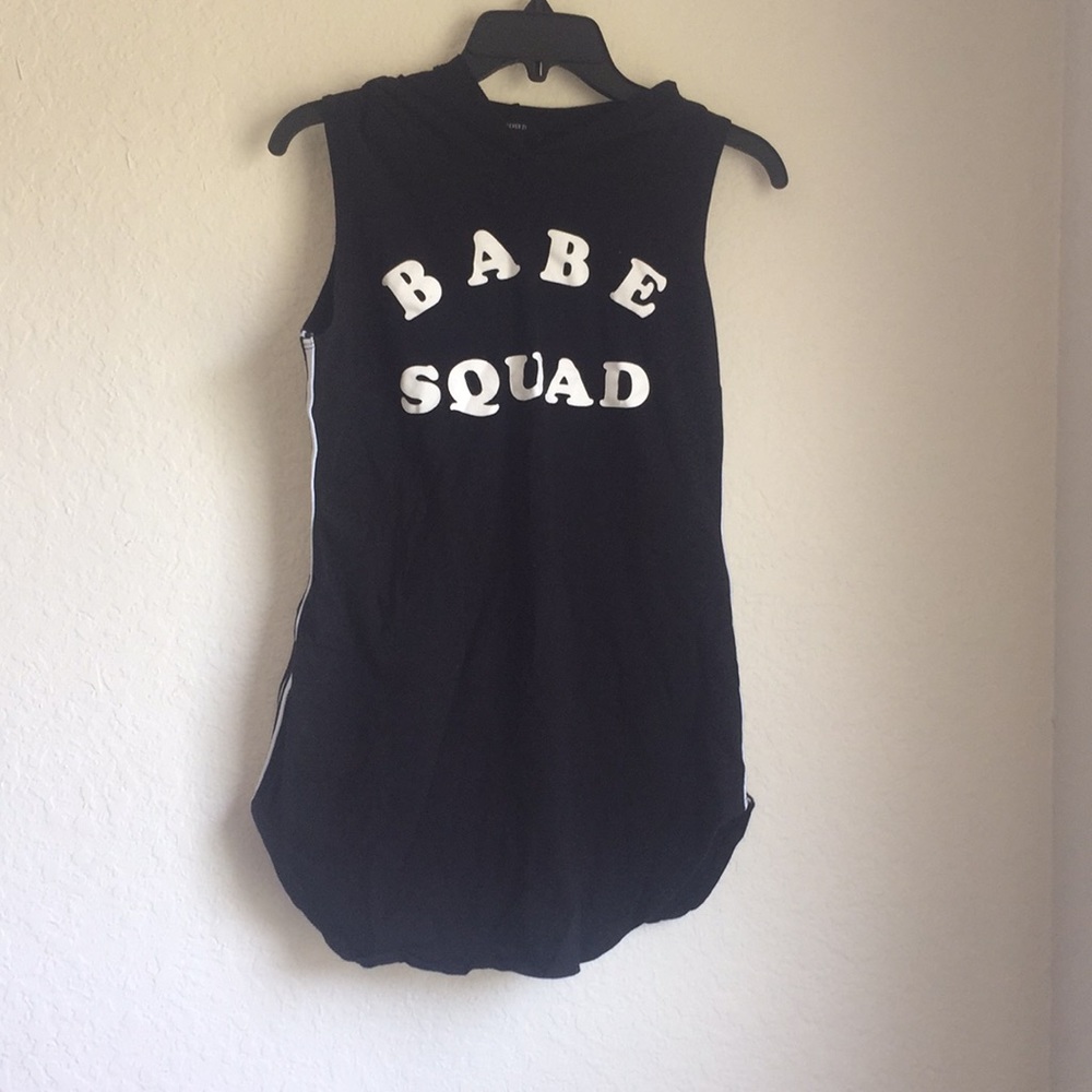 Black and white hooded “Babe Squad” graphic shirt.